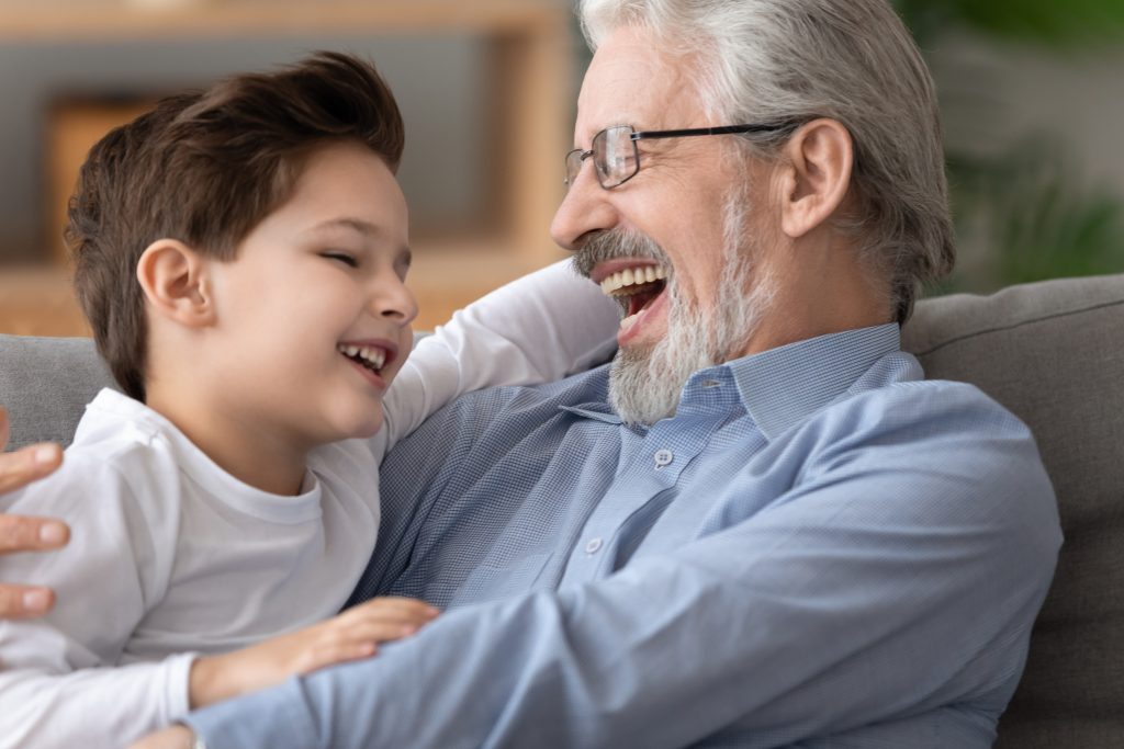 smiling with partial dentures